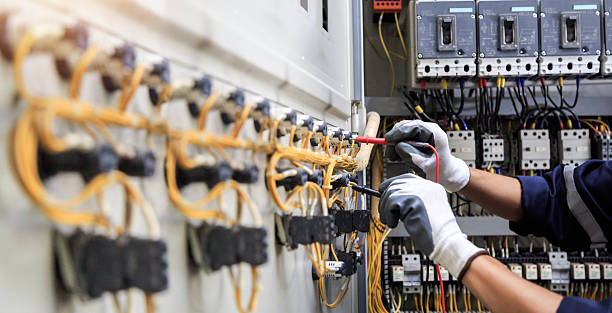 Professional Electrician technician working in Austin, AR